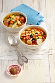 Vegetable soup with beans, bacon and sausage