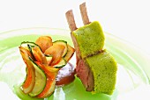 Lamb chops with a herb crust and vegetables