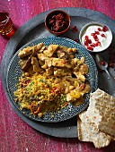 Chicken tagine with couscous and flatbread