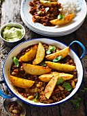 Chilli con carne with potato wedges
