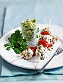 Chicken skewers with tomatoes and guacamole