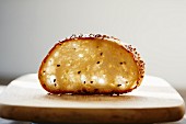 A slice of sourdough bread on a chopping board
