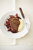 Fillet of beef with shallots cooked in red wine, and mashed potato