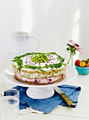 Sandwich cake with vegetables and rocket