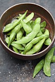 Close up of salted edamame in bowl