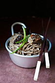Soba noodles with mushrooms and spring onions (Asia)