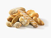 Various types of white bread, baguettes and bread rolls