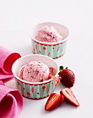 Strawberry ice cream in cardboard cups