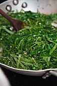 Collard Greens (brassica oleracea leaves) in a pan