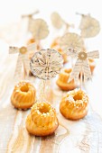 Mini Bundt cakes with sugar crystals and party decoration