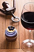 A chianti cupcake and a glass of red wine