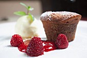 Choco muffin with raspberry and vanilla ice cream
