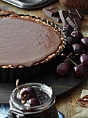 A chocolate tart in the baking tin