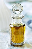 Bath oil in a crystal glass bottle