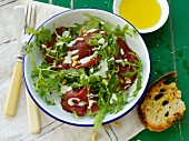 Bresaola with rocket and pine nuts