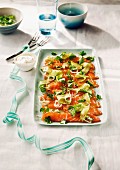 Salmon carpaccio with a courgette salad