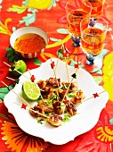 Chicken skewers with a chilli and lime sauce