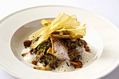 Mushroom risotto with parsnip chips