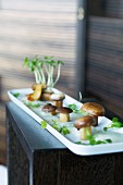 Fried porcini mushrooms with cress