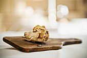 White truffles on a truffle grater