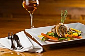 Rolled veal escalope with vegetables