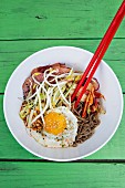 Thai noodles with vegetables, duck and egg