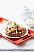 Toast topped with caramelised bananas and ricotta
