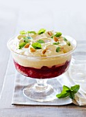 A trifle with raspberries, apricots and vanilla cream