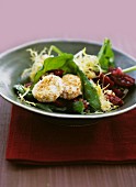 Rocket salad with beetroot and goats cheese with a walnut coating