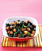 Fried sweet potatoes with spinach