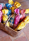 Basket of hand-sewn, silk lavender bags
