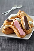 Eclairs with various different toppings