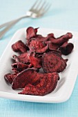 A bowl of beetroot chips