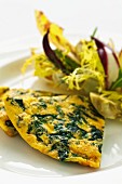 Spinach frittata with a bitter vegetable salad
