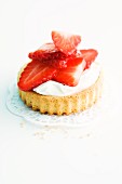 A tartlet topped with creamy quark and strawberries