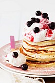 Ricotta pancakes with blueberries and whipped cream