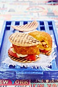 Arancini burgers with tomatoes and onions
