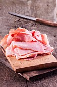 Slices of ham on a chopping board