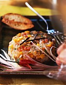 Fish and vegetable tartar with vanilla and grilled bread