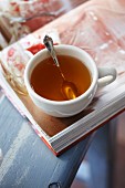 A cup of tea on a book