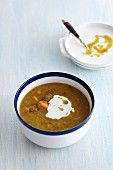 Lentil soup with pumpkin and sour cream