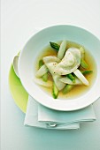 Asparagus and cream cheese won tons in broth