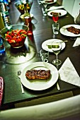 Grilled steaks with salad