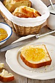Bread spread with marmalade