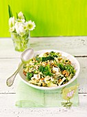 Broccoli salad with egg, blue cheese, sunflower sprouts and walnuts