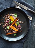 Grilled carrots with red onions and spelt grains