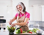 Woman preparing salad