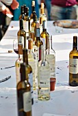 Empty wine bottles on a cleared table (Portugal)