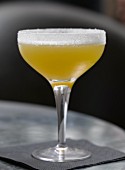 A cocktail made with whiskey and apple juice