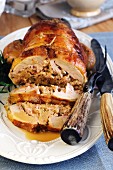 Roast guinea fowl breast stuffed with sausage meat and chestnuts